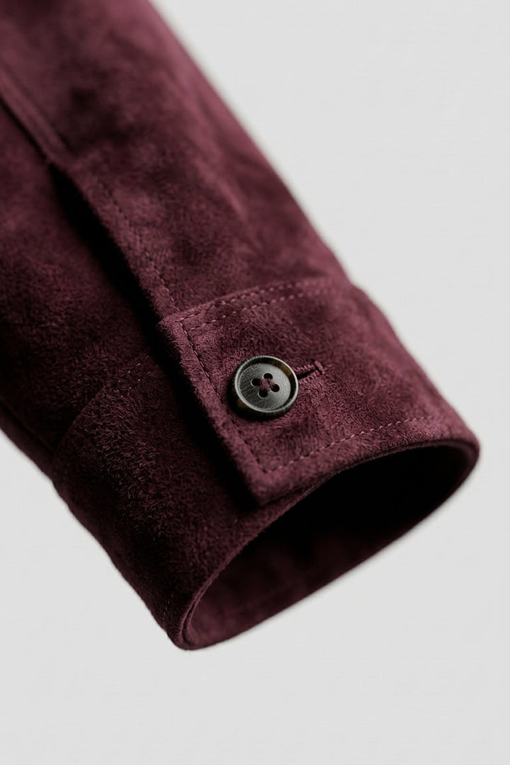 IVY - Close-up of burgundy suede jacket sleeve and cuff