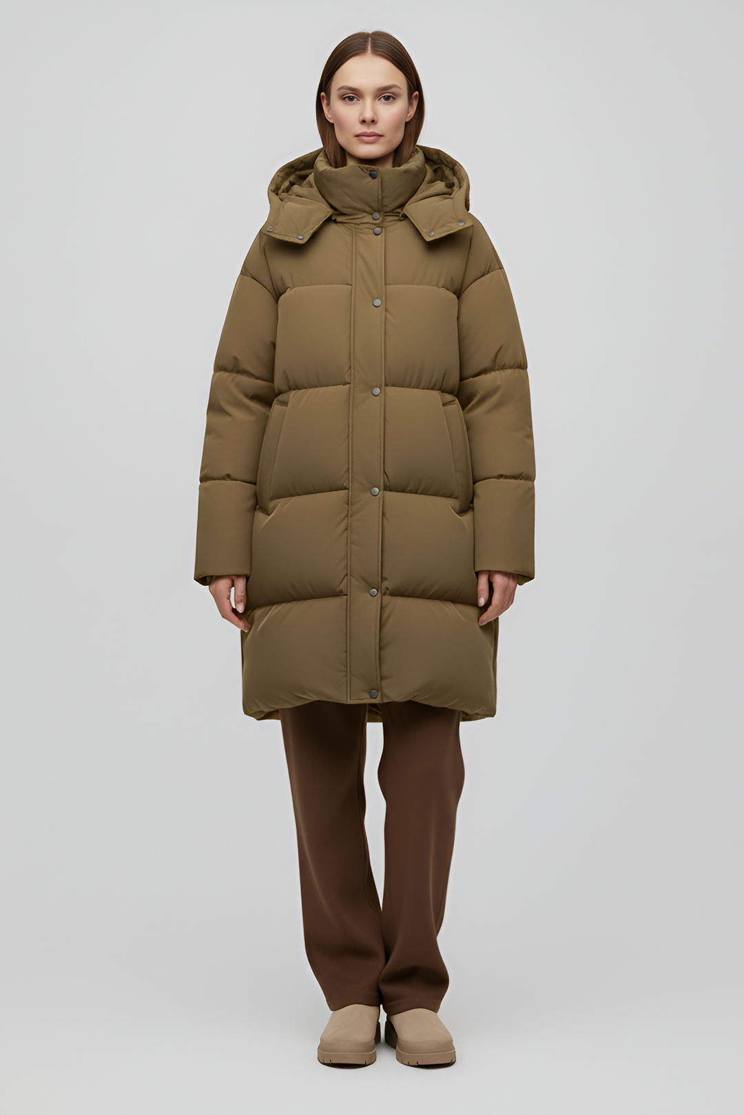 Khaki puffer coat with a hood on a white background