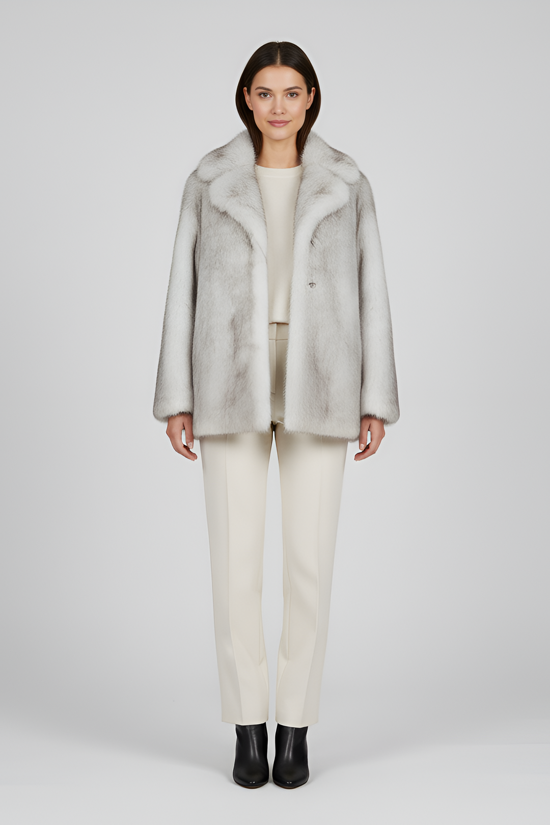 Close-up of LEOVARA coat’s fleece and wool-blend fabric with detailed leopard spots.