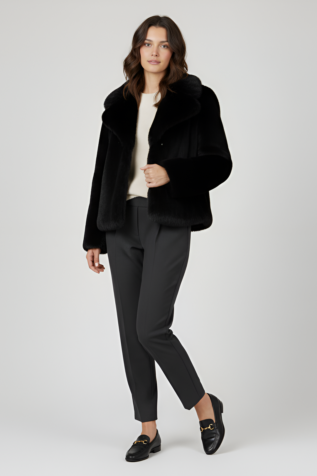 LOUVIA  faux fur long coat in black offers luxury warmth, satin lining, and timeless winter elegance.