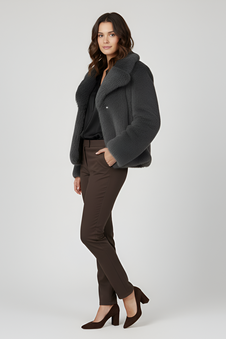 LOUVIA  faux fur long coat in grey offers luxury warmth, satin lining, and timeless winter elegance.