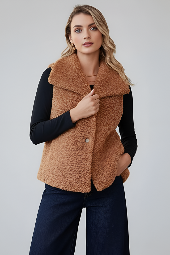 Luxurious brown faux fur jacket with fluffy texture.