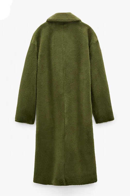 Green coat on a white background