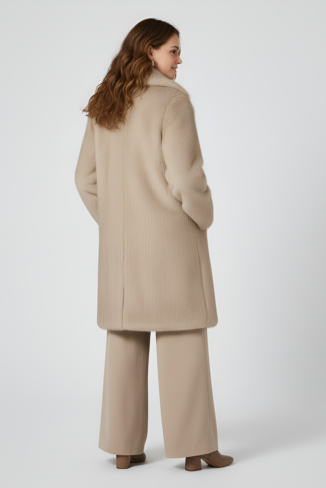 Back view of MAWEII faux fur long coat for women in soft beige tone, elegant winter outerwear with long silhouette, premium faux fur texture, modern minimalist fashion style