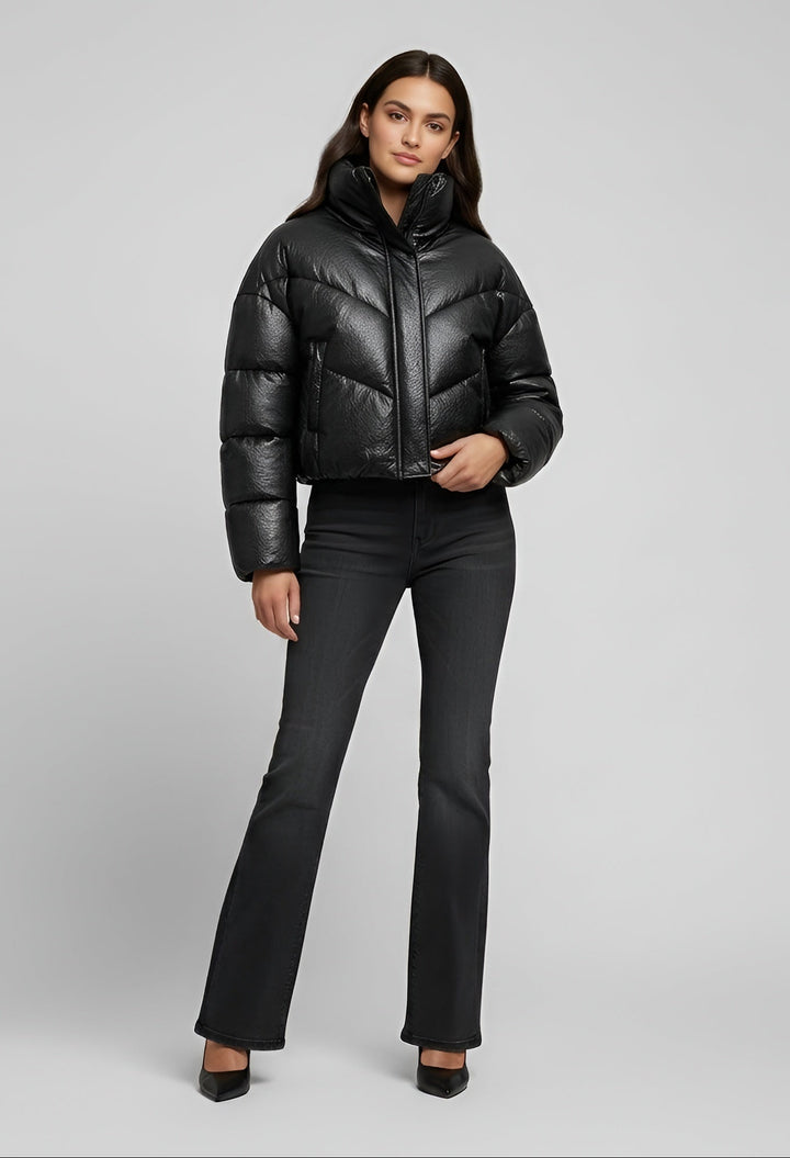 MCKENNA - Woman wearing black puffer jacket and black jeans