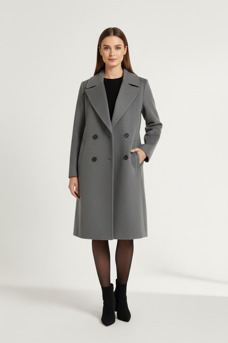 Woman wearing a gray coat on a white background