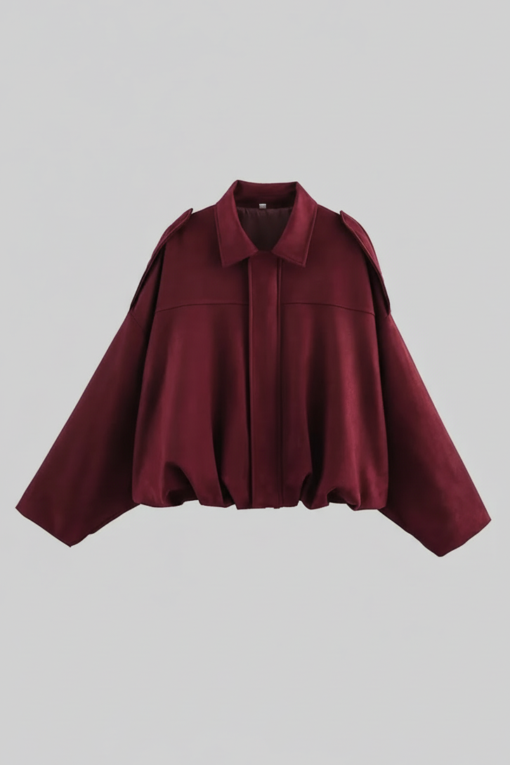 Maroon cape on a light gray background