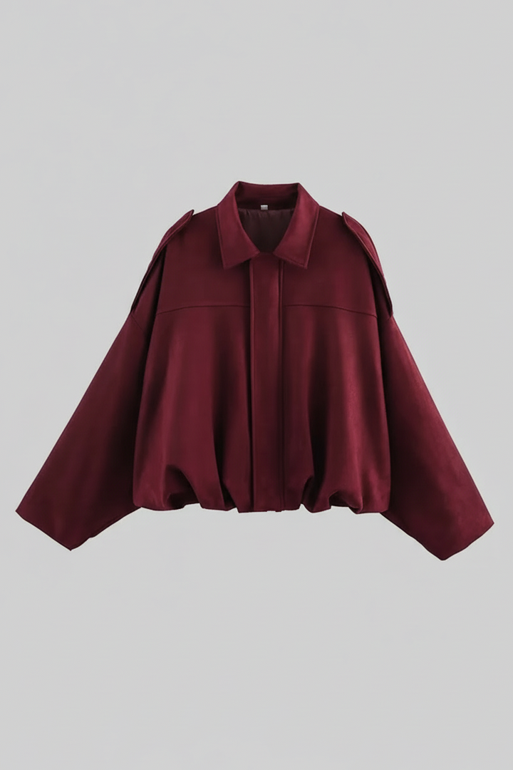 Maroon cape on a light gray background
