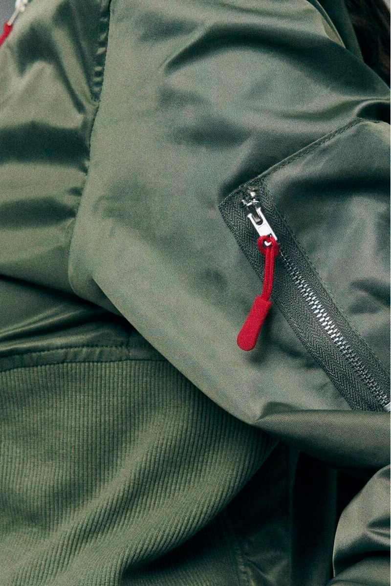 Model styling AERLYN Cropped Bomber Jacket for a chic casual autumn look.