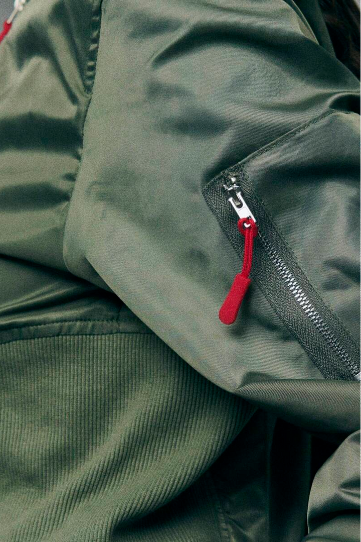 Model styling AERLYN Cropped Bomber Jacket for a chic casual autumn look.