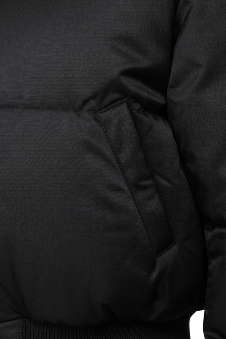 Model styling CAELIA Oversized Bomber Jacket for a modern urban winter streetwear look.