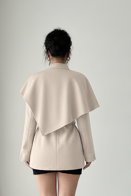 Model styling ELENZGA Wool Blend Long Coat for an elegant, minimalist winter look.