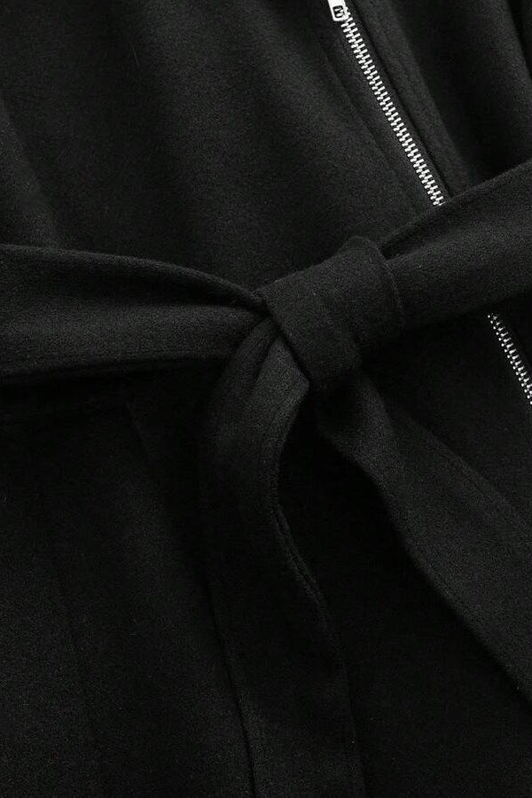 Model styling LEONA Wool Blend Long Coat with chic all-black outfit for modern elegance.