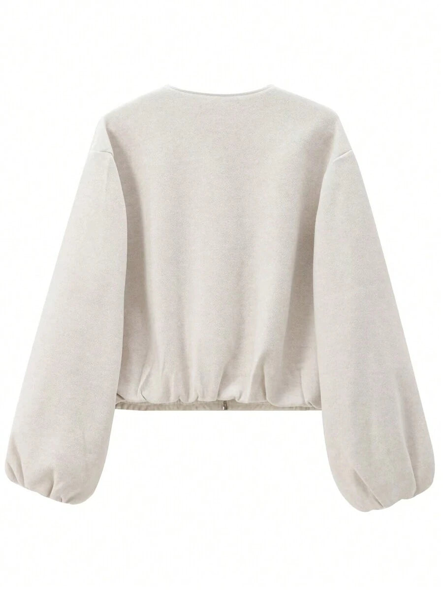 Model styling VALERINE Velvet Bomber Jacket for a casual autumn-winter street look.