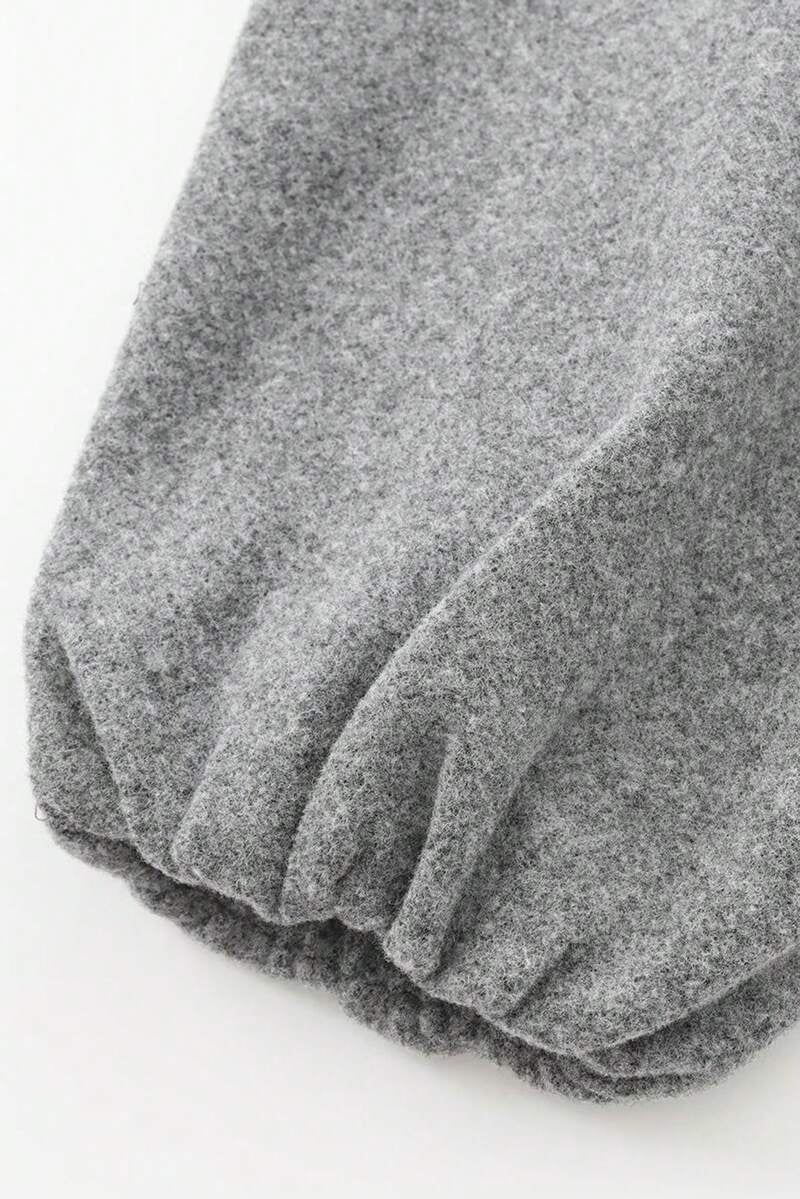 Model styling VALERINE Velvet Bomber Jacket for a casual autumn-winter street look.