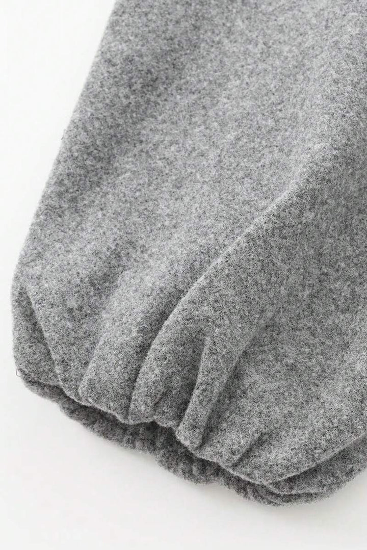 Model styling VALERINE Velvet Bomber Jacket for a casual autumn-winter street look.