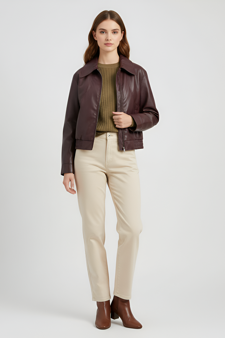 Model wearing Dalvera brown faux leather cropped jacket with casual outfit