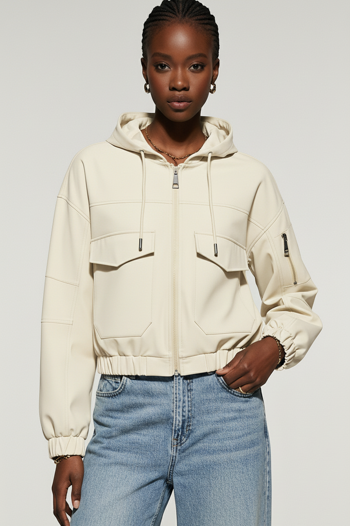 Model wearing the MAERIS Hooded Cropped Trench Coat with full zipper and hood.