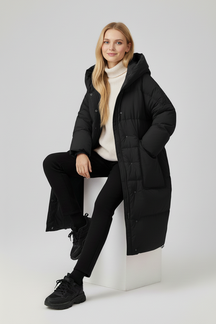 NORAVEN Hooded Down Coat – Model standing wearing taupe down coat