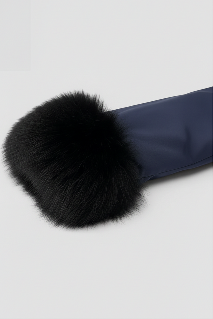 Navy blue mittens with black fur cuffs on a light gray background