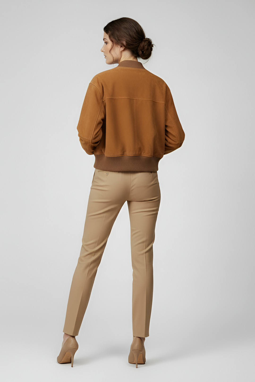 PRESLEY - Woman in bomber jacket and slim-fit pants, back view