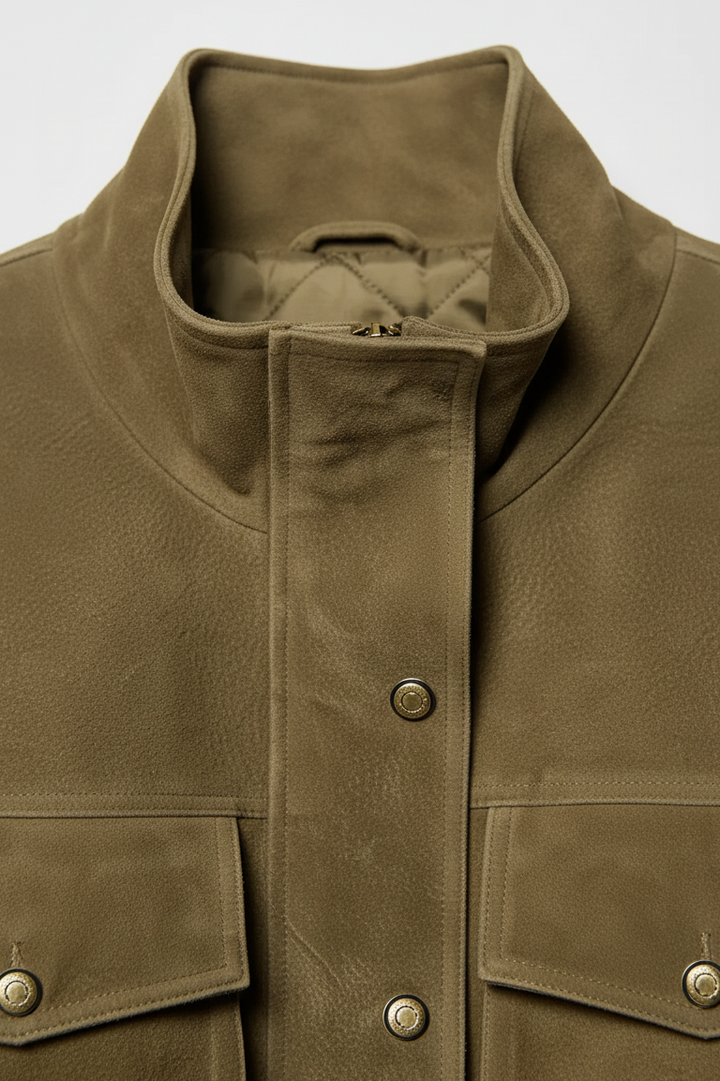 QUINN - Side view, model with hands in pockets of suede jacket
