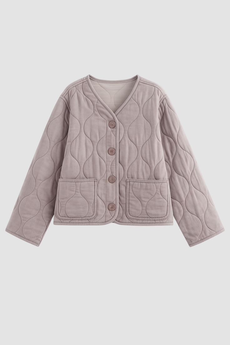 Quilted cardigan with button details on a white background