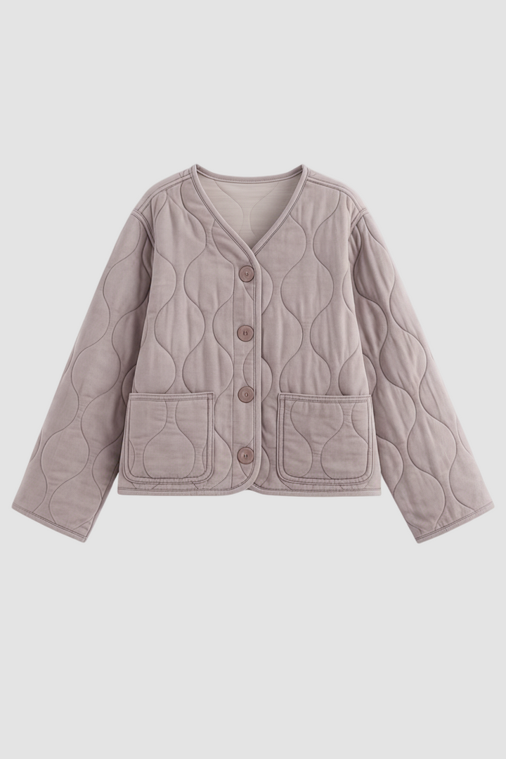 Quilted cardigan with button details on a white background
