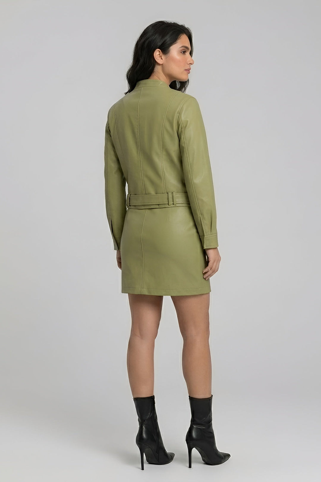 ROWYN - Woman in olive leather dress, Back view, fashion photography