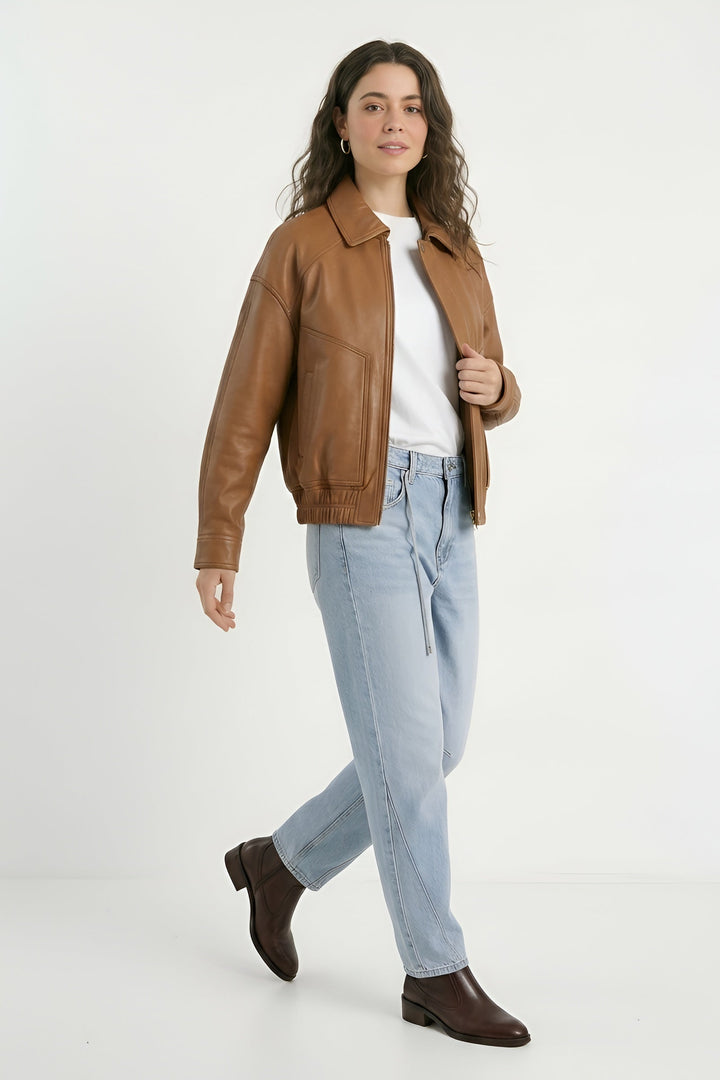 RYLEE - Brown leather jacket, model posing with hand in pocket