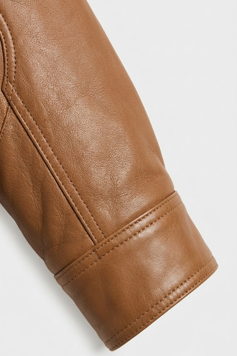 RYLEE - Brown leather jacket sleeve detail, top stitching