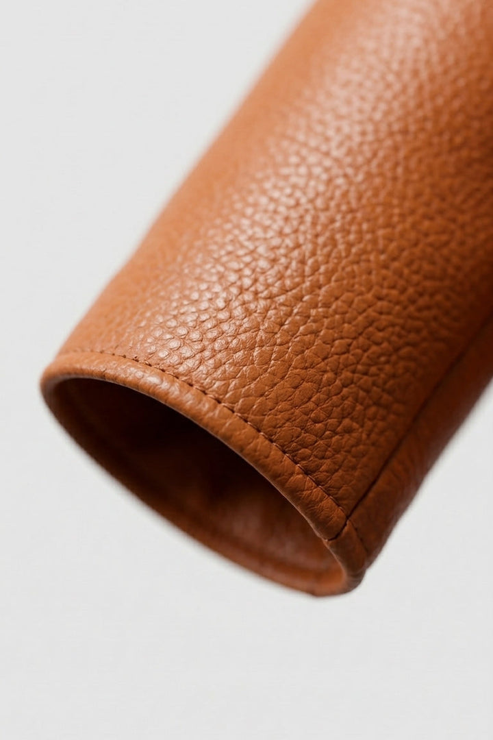 SAWYER - Cuff of brown leather jacket