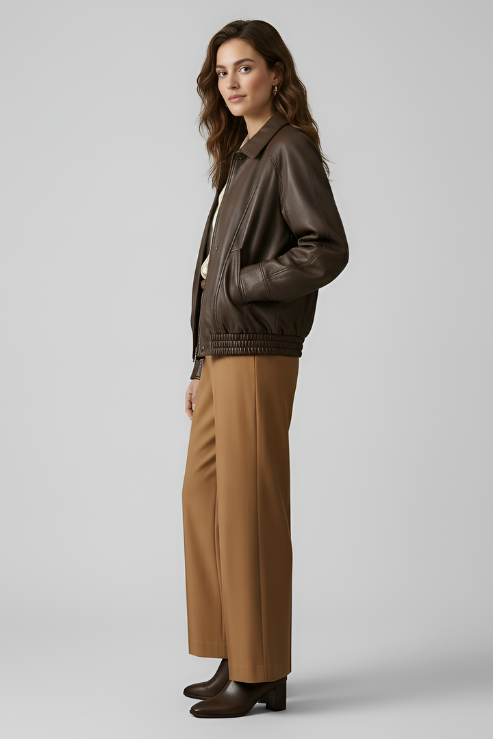 SCARLETT - Woman in brown leather bomber jacket side view
