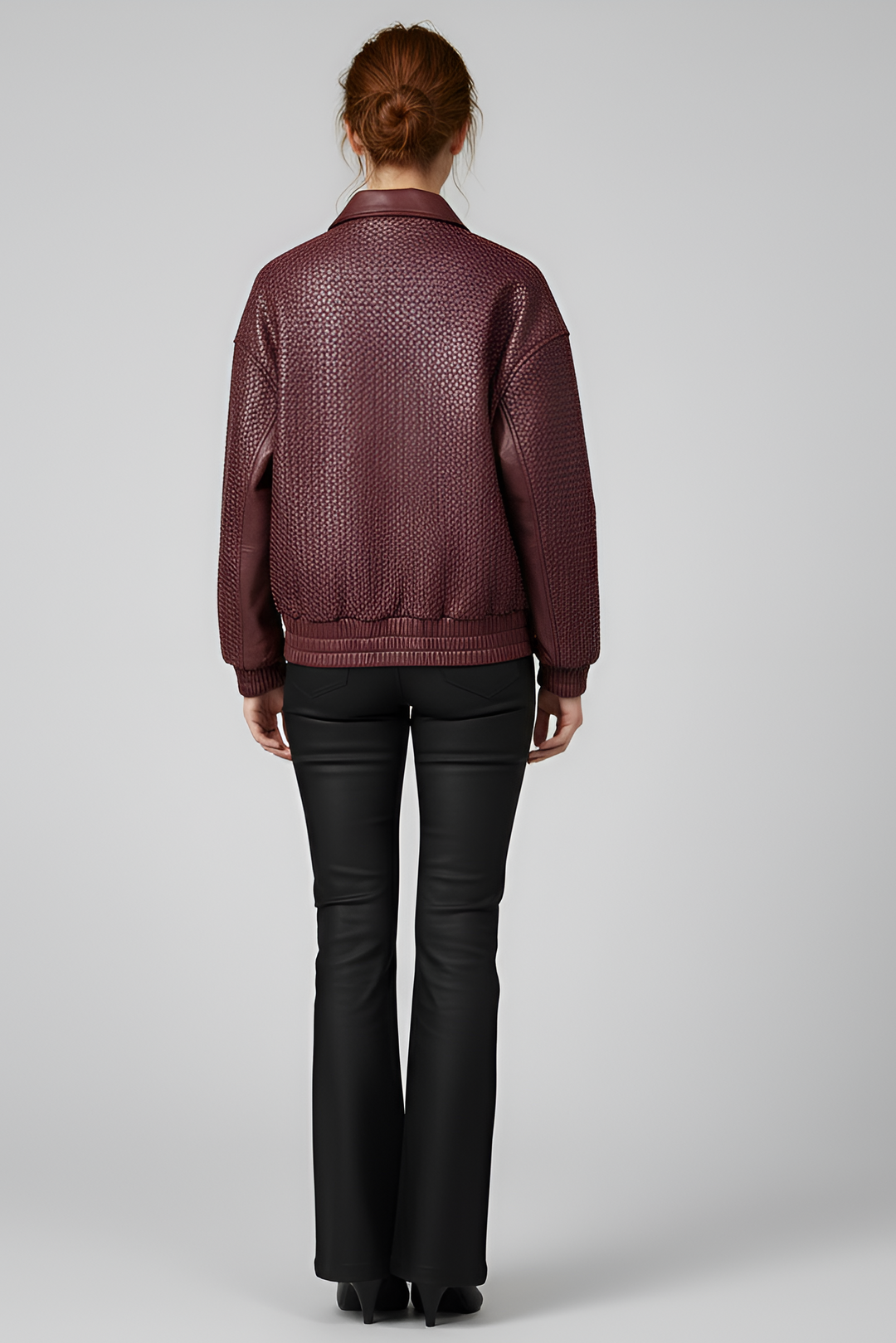SUTTON - Model wearing burgundy woven jacket and black flared pants, back view