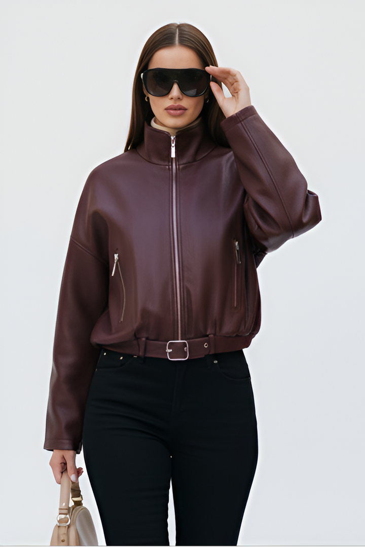 Add edge to your look with the AVELON Faux Leather Bomber Jacket — burgundy PU, zip front, and funnel neck for bold urban style.