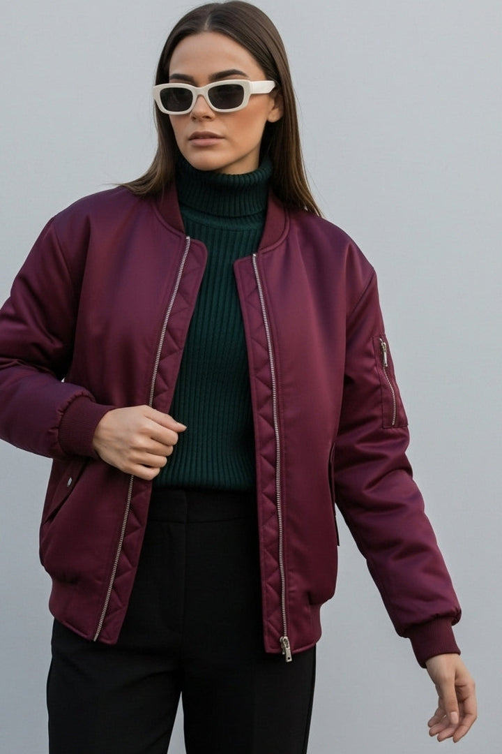 Side profile of LYRIEL Purple Puffer Bomber Jacket showing rich purple color and regular fit.