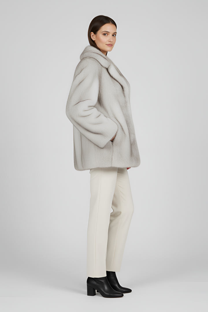Side profile of the LEOVARA oversized winter fur coat highlighting plush faux-fur construction.
