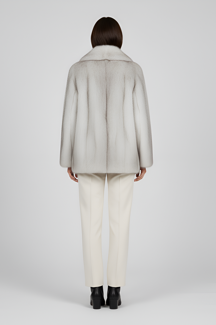 Side profile of the LEOVARA oversized winter fur coat highlighting plush faux-fur construction.