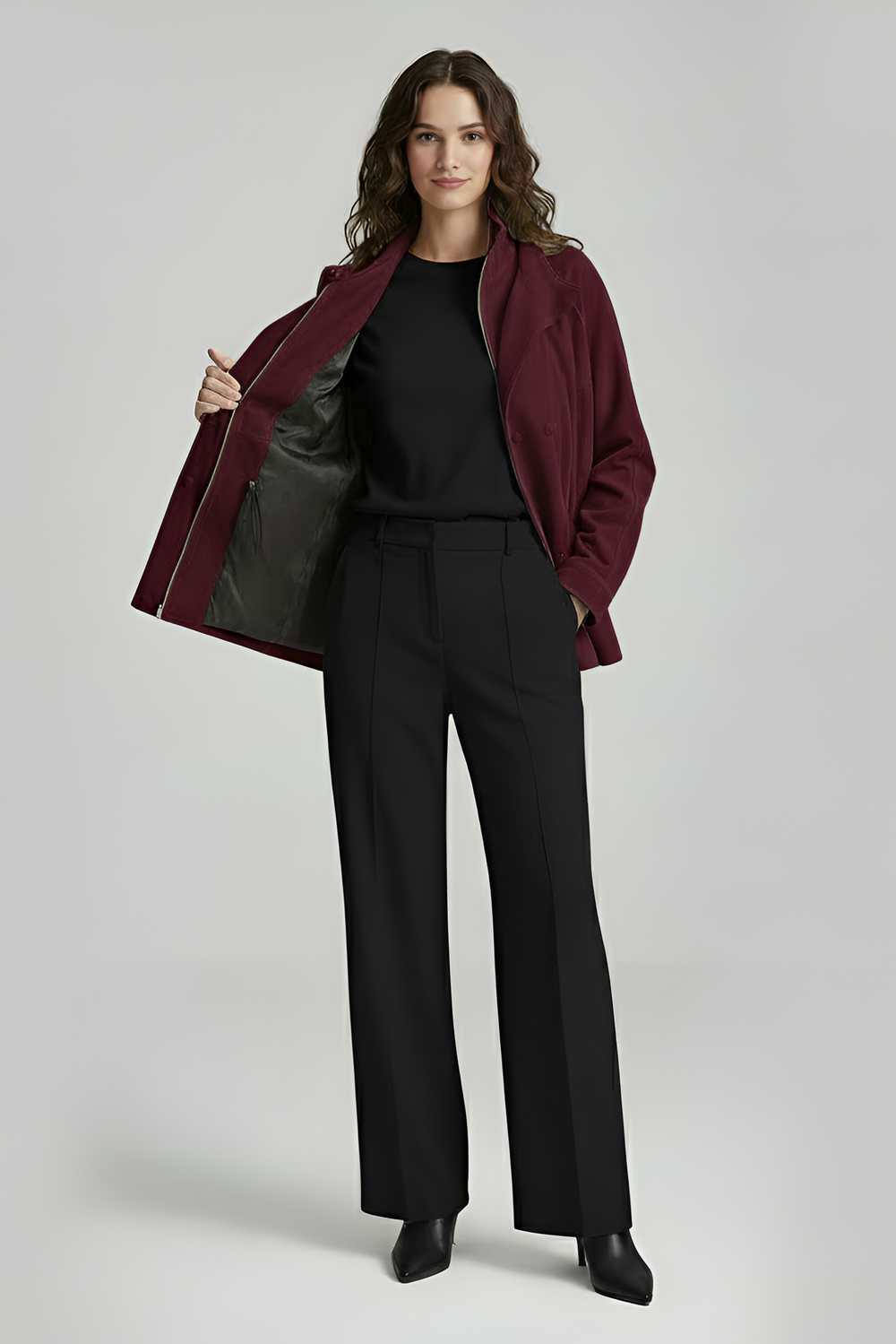 TESSA - Model wearing burgundy leather bomber jacket