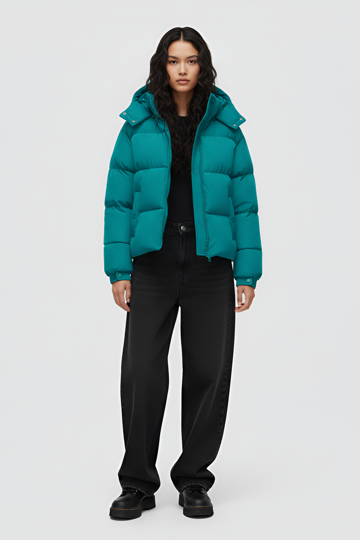 Teal puffer jacket with a hood on a white background
