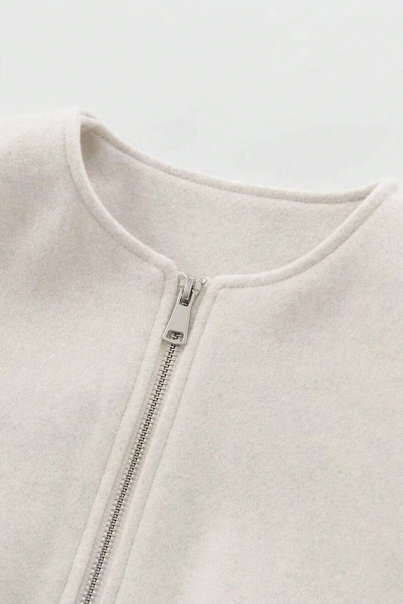 Model styling VALERINE Velvet Bomber Jacket for a casual autumn-winter street look.