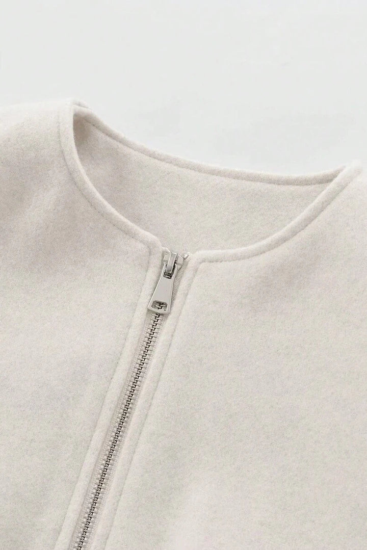 Model styling VALERINE Velvet Bomber Jacket for a casual autumn-winter street look.