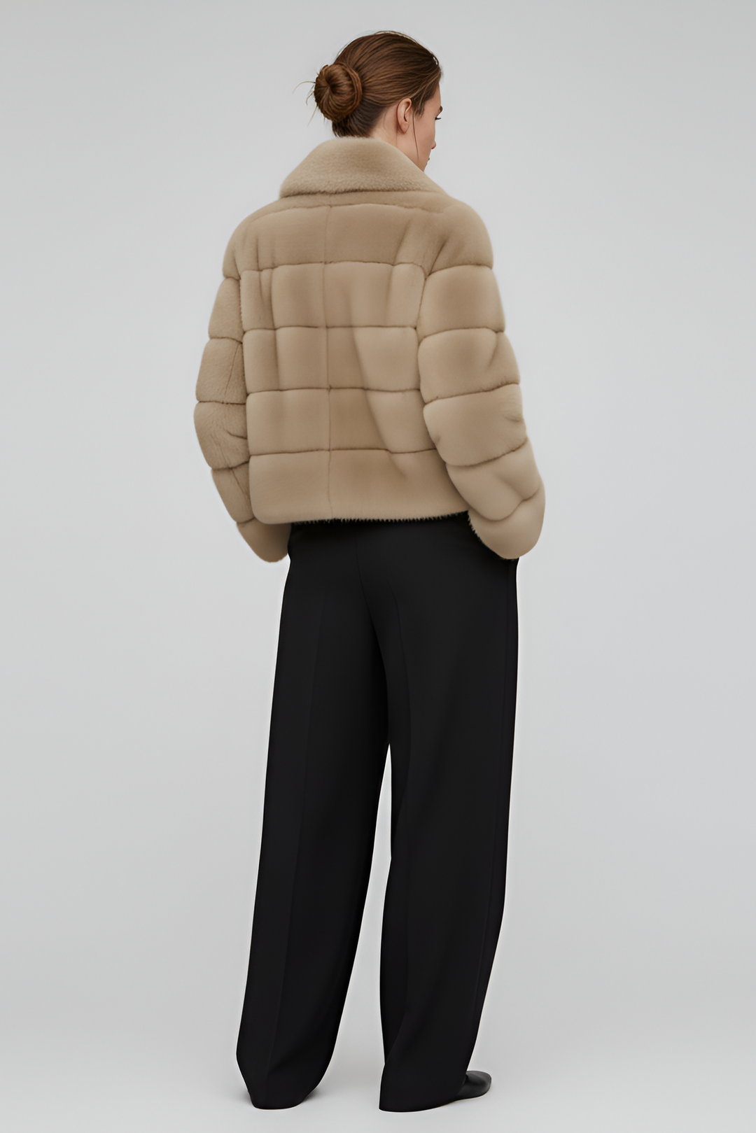 Side angle of the VELARIE faux fur coat highlighting its elegant silhouette.