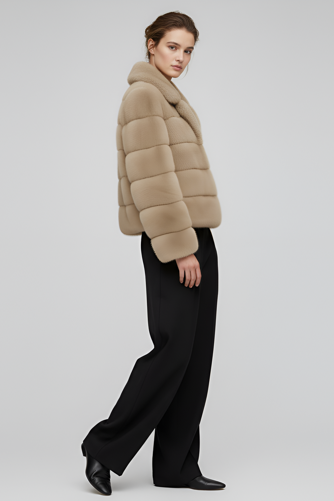 Side angle of the VELARIE faux fur coat highlighting its elegant silhouette.
