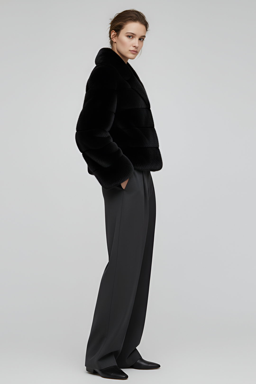 Soft faux fur texture shown in a close lifestyle view of the VELARIE coat.