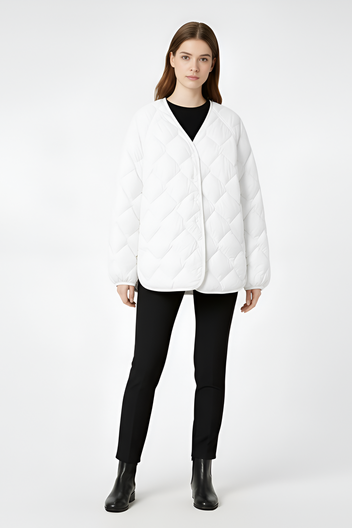 Experience effortless winter comfort with the Lightweight Down Warm Quilted Coat, crafted for women who value simplicity, softness, and everyday elegance.