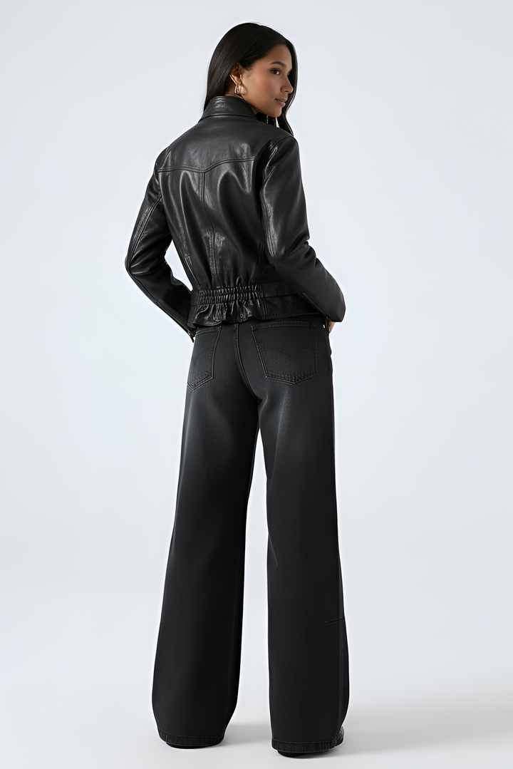 WILLOW - Full-body shot of black leather jacket and wide-leg jeans back view