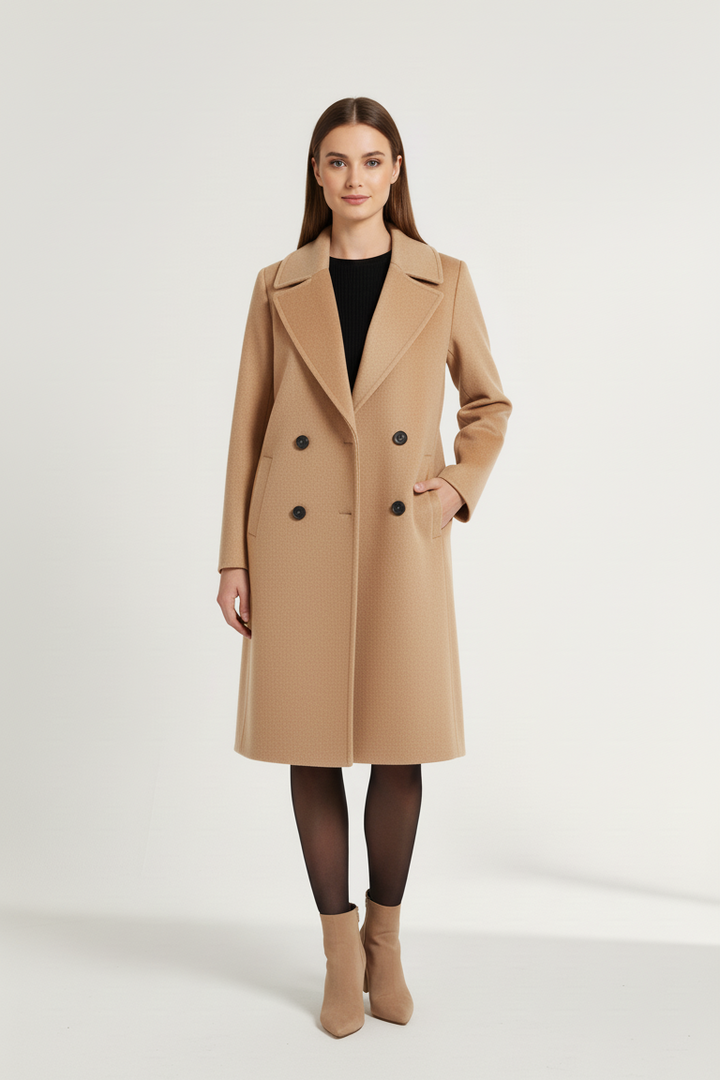 Woman wearing a beige coat on a white background