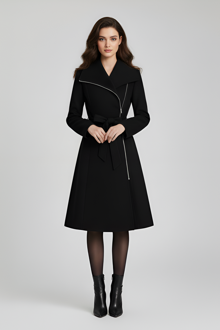 Woman wearing a black coat on a white background