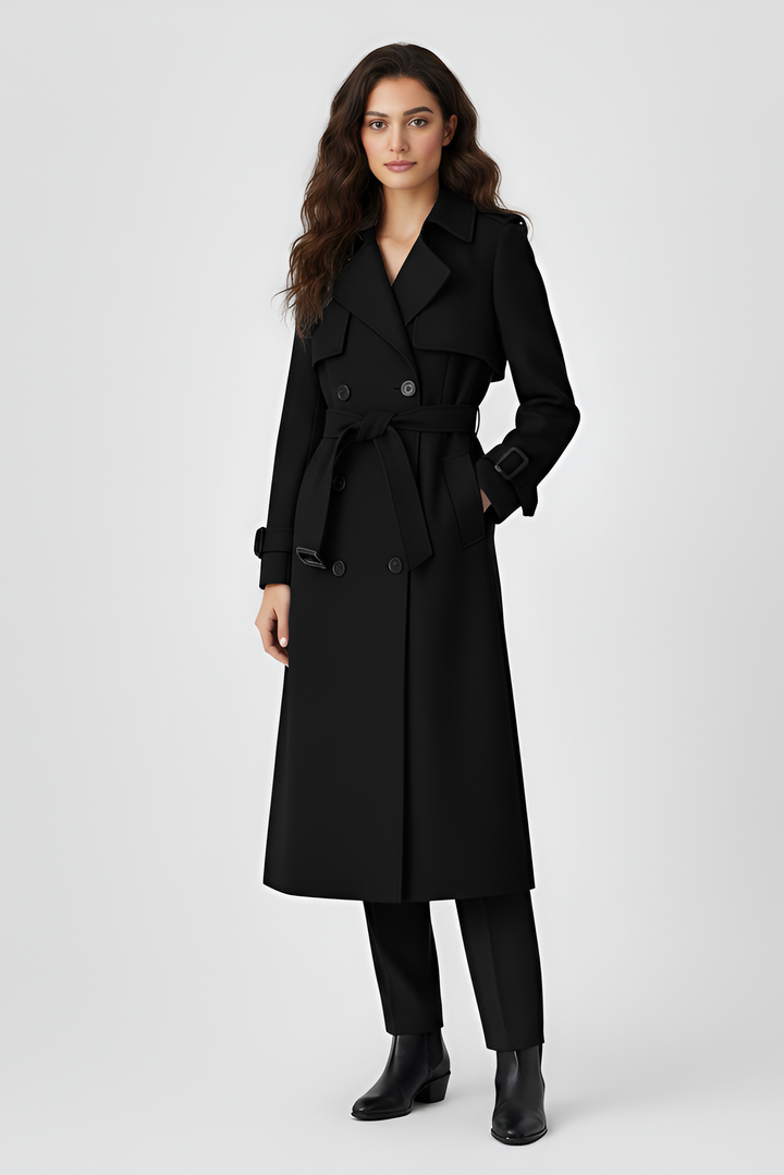 Woman wearing a black coat on a white background